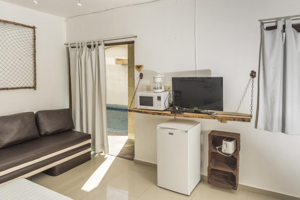 Caribe Corazon Hotel Boutique Плайя-дель-Кармен Номер фото